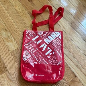 Lululemon reusable small shopping bag - red and white.